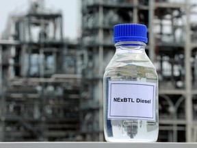 A bottle of diesel seen by Neste Oyj's renewable diesel plant in Singapore. The Finnish company plans to build a refinery in Quebec that would use forestry waste such as treetops and branches to produce renewable diesel.