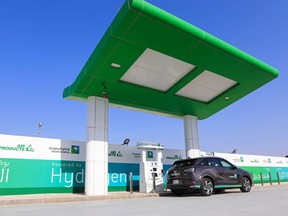 A hydrogen-powered vehicle during refueling at the newly opened hydrogen fueling station, operated by Saudi Aramco, in the Air Products New Technology Center in Dhahran, Saudi Arabia.