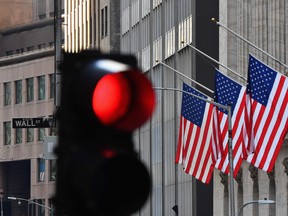 Stocks at all three main Wall Street indexes fell Wednesday after the Fed decision.