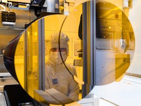 An employee of the semiconductor manufacturer Bosch works in Dresden, eastern Germany.