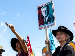 Actress and Climate activist Jane Fonda, right, and Indigenous community members gather before praying for water during a rally and march in Solvay, Minnesota, on June 7, 2021.