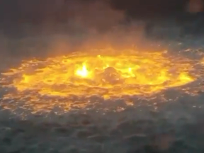Bright orange flames jumping out of water resembling molten lava was dubbed an "eye of fire" on social media due to the blaze's circular shape, as it raged a short distance from a Pemex oil platform.