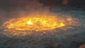 Bright orange flames jumping out of water resembling molten lava was dubbed an 