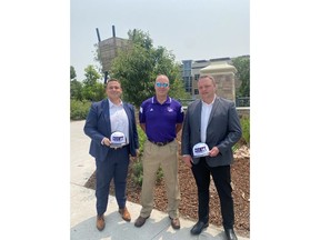 Castle Rock Autoplex Donates $50,000 To Douglas County High School Football Program. Pictured: Jose Medina, Coach Eric Rice, and Travis Van Spronsen