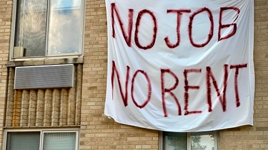 A banner against renters eviction hangs on an apartment building during the pandemic in August, 2020, when COVID restrictions had shut down many businesses, putting millions out of work.
