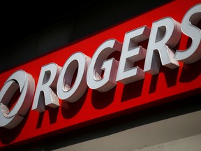 Rogers Communications Inc. committed $3.3 billion in the government's spectrum auction, while BCE Inc. spent $2.1 billion and Telus Corp. more than $1.9 billion.