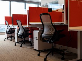 Empty cubicles in an office.