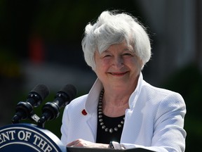 U.S. Treasury Secretary Janet Yellen smiles during a press conference at Winfield House in London on June 5, 2021, after attending the G7 Finance Ministers meeting.