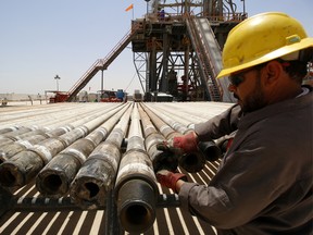 A man working at Rumaila oilfield in Basra, Iraq.