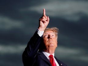 Former U.S. president Donald Trump gestures while speaking to his supporters during the Save America Rally in Sarasota, Florida, July 3, 2021.