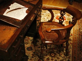 Charles Dickens' writing desk and chair at Christie’s auction house, in London, in 2008.