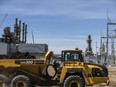 A truck hauls dirt at the Inter Pipeline Heartland Petrochemical Complex under construction in Strathcona County, Alberta.