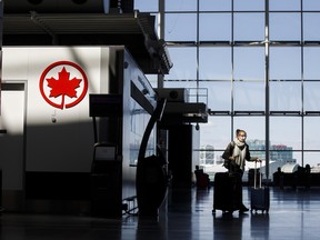 Air Canada reported a smaller second-quarter loss on Friday.