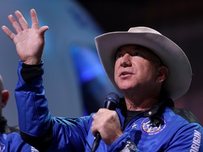 Jeff Bezos speaks about his flight on Blue Origin’s New Shepard into space during a press conference on July 20, 2021 in Van Horn, Texas.