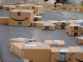 Packages emblazoned with Amazon logos travel along a conveyor belt inside of an Amazon fulfillment centre in Robbinsville, New Jersey,.