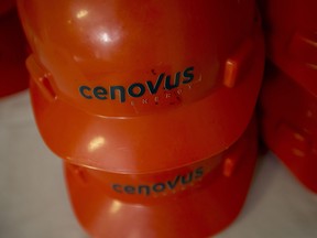 Cenovus Energy Inc. safety hats sit on a table at the Christina Lake oil production facility in Alberta.