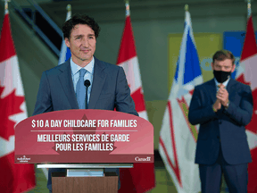 Prime Minister Justin Trudeau with Newfoundland and Labrador Premier Andrew Furey at a news conference to announce the province has struck a deal with Ottawa for a $10-a-day child-care program, in St. John's, N.L. on Wednesday, July 28, 2021.