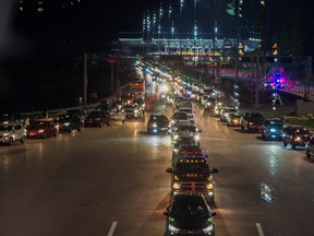 Travellers line up to enter Canada this morning after border restrictions were loosened to allow fully vaccinated U.S. residents, after the COVID-19 pandemic forced an unprecedented 16-month ban, at the Thousand Islands Bridge crossing in Lansdowne, Ontario.