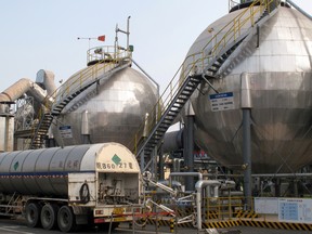 Carbon dioxide storage tanks are seen at a cement plant and carbon capture facility in Wuhu, Anhui province, China.