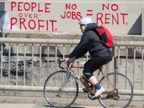 Graffiti in Toronto broadcasts the hardships of people laid off in the pandemic.