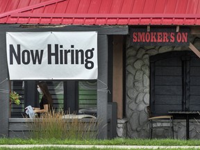 An employee at Oakville's Montana's Restaurant walks past signage stating "Now Hiring" during the Covid 19 pandemic, Wednesday July 14, 2021.

















































































































 

































































































































































































 































































































































































































 

































































































































































































 































































































































































































 



























































































































































































OAKVILLE, ONTARIO: JULY 14, 2021—PANDEMIC--An employee at Oakville's Montana's BBQ & Bar walks past signage stating "Now Hiring" during the Covid 19 pandemic, Wednesday July 14, 2021.  [Peter J Thompson]  [National Post story by TBA/National Post]