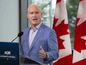 Conservative Leader Erin O'Toole speaks to the media, Aug. 18, 2021, in Quebec City.