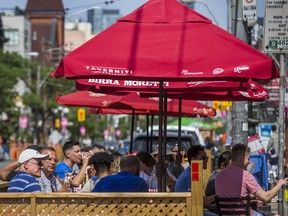 Patios along College St. in a Toronto neighbourhood as Ontario reopens.