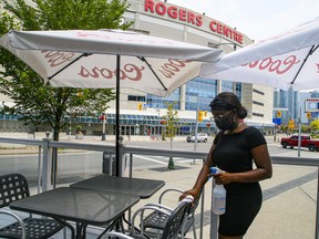 Restaurants get ready for the Toronto Blue Jays to return to the Rogers Centre at the end of July. Full-time employment rose by 83,000, mostly driven by youth and women aged 25-54, while part-time employment rose by 11,000.