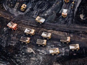 Heavy haulers are seen at the Fort Hills mine in this aerial photograph taken above the Athabasca oilsands near Fort McMurray.