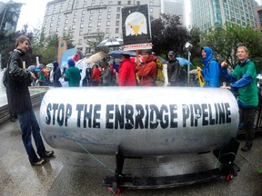 Members of ForestEthics demonstrate against Enbridge Inc.'s Northern Gateway pipeline in Vancouver, on Aug. 31, 2010.