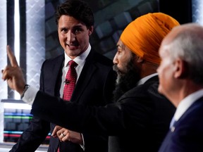 Liberal Leader Justin Trudeau, NDP Leader Jagmeet Singh, and Conservative Leader Erin O'Toole take part in the federal election debate in Gatineau, Sept. 9, 2021.