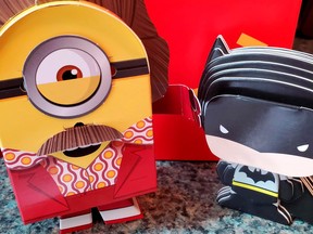 McDonald's Batman and Minions toys made from paper and cardboard that children assemble themselves in New York, U.S. Sept. 20, 2021.