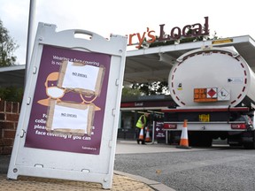 Dozens of forecourts in Britain were closed with signs saying they had no petrol or diesel.