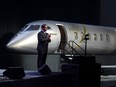 Eric Martel, President and Chief Executive Officer of Bombardier Inc., unveils a mockup of its new Challenger 3500 business jet at a virtual event in Montreal, Sept. 14, 2021.