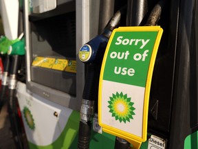 A sign reading 'Sorry out of use' on a diesel pump at BP Plc petrol station in Brentwood, U.K., last week. BP Plc, the second-largest fuel retailer in the U.K., said it’s shutting some of gas stations because of a nationwide truck driver shortage that’s threatening to derail the country’s economic recovery.
