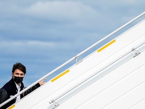 Liberal Prime Minister Justin Trudeau boards his campaign plane in Halifax, on Wednesday.