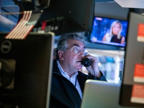 A trader works on the floor of the New York Stock Exchange on Monday.