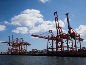 Gantry cranes stand at the Port of Vancouver.