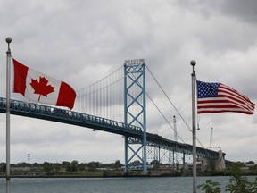 Canadians who have been vaccinated will be able to cross the Ambassador Bridge connecting Canada to the U.S. in Windsor, Ontario on Nov. 8.