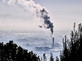 A haze of pollution over Lyon, south-eastern France on October 15, 2021. - A crunch UN climate meeting (COP26) which is scheduled to be held in Glasgow  will look to accelerate global action to meet the Paris Agreement goals of capping global warming at "well below" two degrees Celsius from preindustrial levels, preferably under 1.5C.