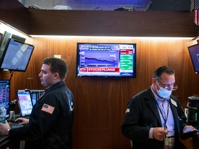 Traders work on the floor of the New York Stock Exchange in New York, U.S., on Sept. 20, 2021.