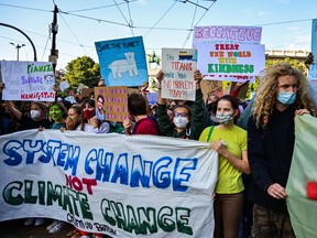 Young climate activists march during a Fridays for Future students' strike on Oct. 1, 2021 on the sidelines of the Youth4Climate and Pre-COP 26 events in Milan.