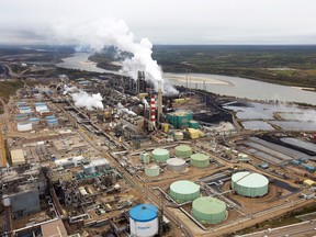 The Suncor tar sands processing plant near the Athabasca River at their mining operations near Fort McMurray, Alberta, Sept. 17, 2014.