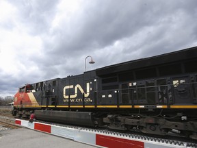 A Canadian National Railway locomotive pulls a train in Montreal on April 20, 2021.