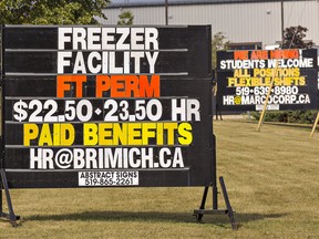 Mobile signs listing jobs available throughout Brantford as the economy starts to improve.