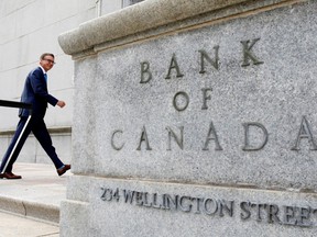 Governor Tiff Macklem walks outside the Bank of Canada building in Ottawa on June 22, 2020.