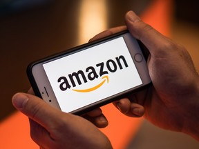 The logo of Amazon.com Inc. on an Apple Inc. iPhone smartphone in London, U.K., on Aug. 20, 2018.
