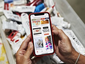 The Pinterest application is seen on an iPhone. PayPal has recently approached the social media company about a potential deal, sources say.