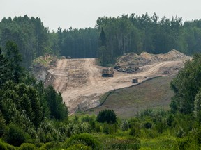 In this file photo taken on August 7, 2021 sections of the Enbridge Line 3 pipeline are seen on the construction site near La Salle Lake State Park in Solway, Minnesota.