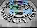 The International Monetary Fund warns threats to growth have increased, pointing to the Delta variant, strained supply chains, accelerating inflation and rising costs for food and fuel.